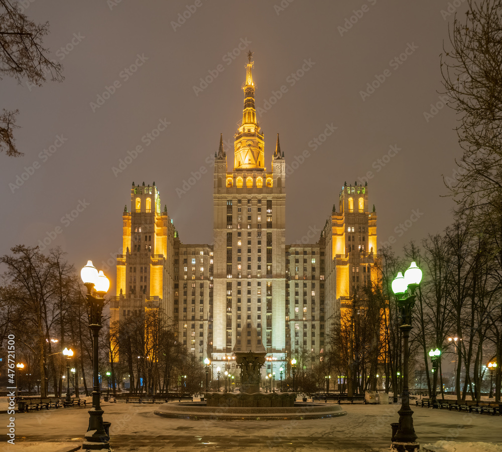 Winter Night view on the residential Stalinist high-rise building on Kudrinskaya Square with illumination. It is the one of seven Stalinist skyscrapers built in 1947-1954.