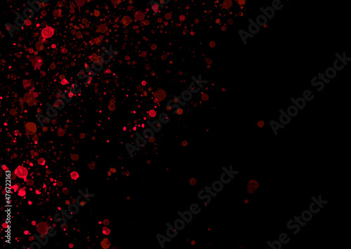 Black background with red splashes on the left side