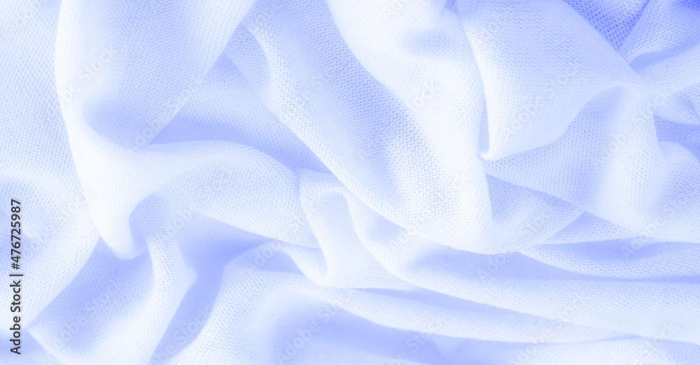 Blue fabric. abstract background of luxury fabric or liquid silk texture of waves or wavy folds. background or elegant wallpaper design. Cotton texture, natural fabric and dye, bright blue color