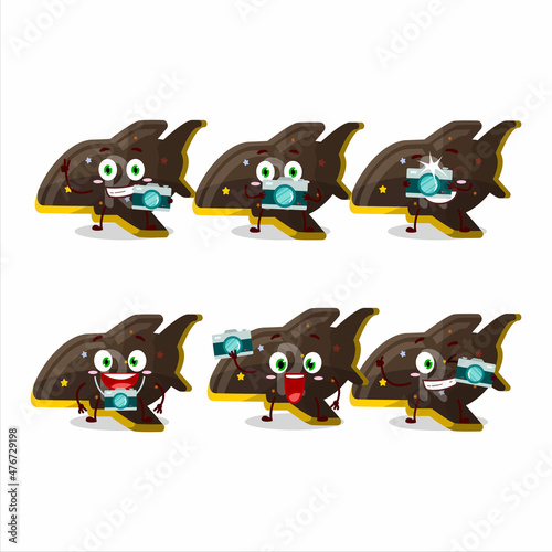 Photographer profession emoticon with plane chocolate gummy candy cartoon character