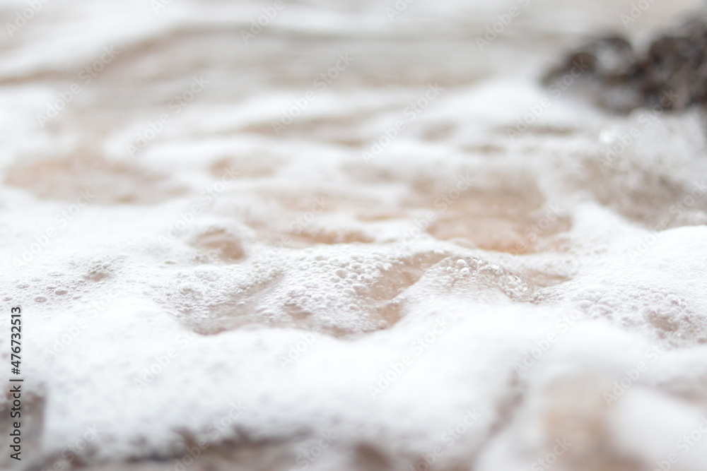 close up of a white knitted fabric close up of a white knitted fabric