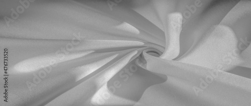 Texture, background, pattern, silk fabric of white color, solid light white silk satin fabric of the duchess Really beautiful silk fabric with satin sheen. Perfect for your design, wedding invitation photo