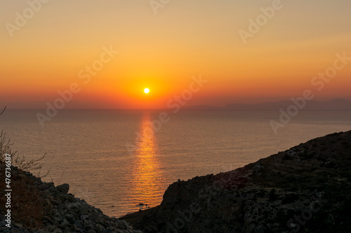 Beautiful sunset behind Kythera island. Natural beauty in an idyllic Greek island