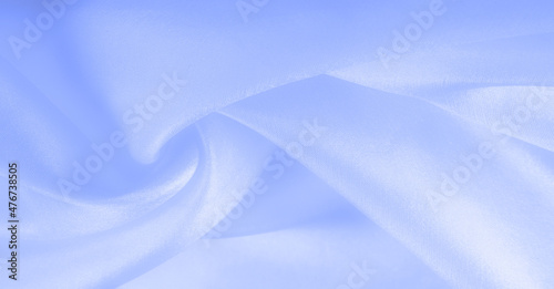 Blue pale silk fabric, smooth elegant blue silk or luxury satin fabric, texture as a wedding background. Luxury background design. Retro style.
