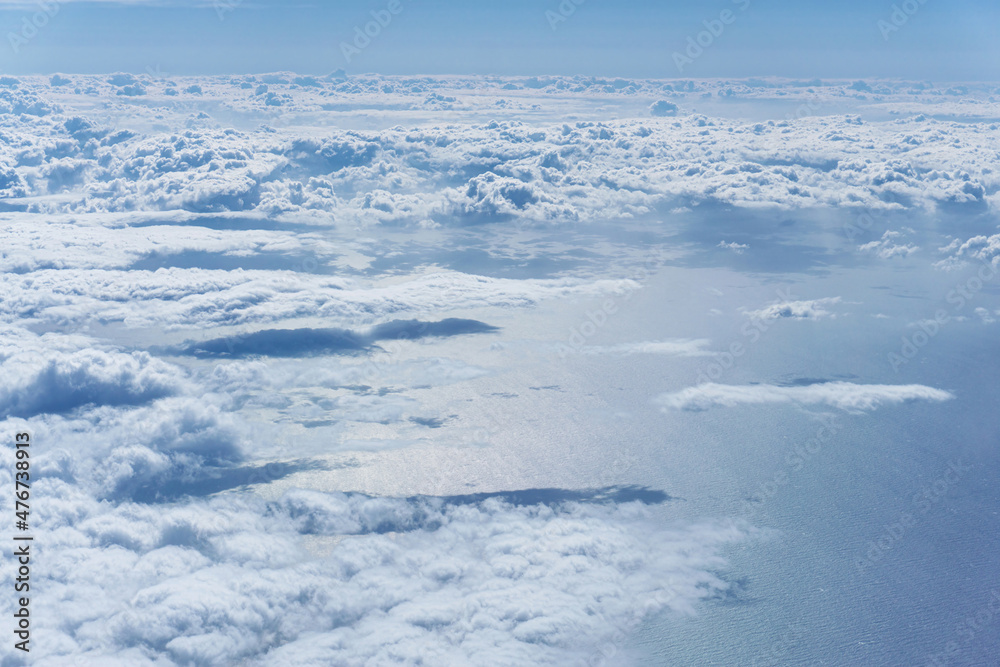 Aerial view of the cloudy sky above the sea