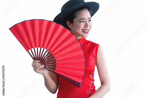 Beautiful woman wearing traditional Chinese dress holding big red fan on white background, Chinese new year concept, with clipping path