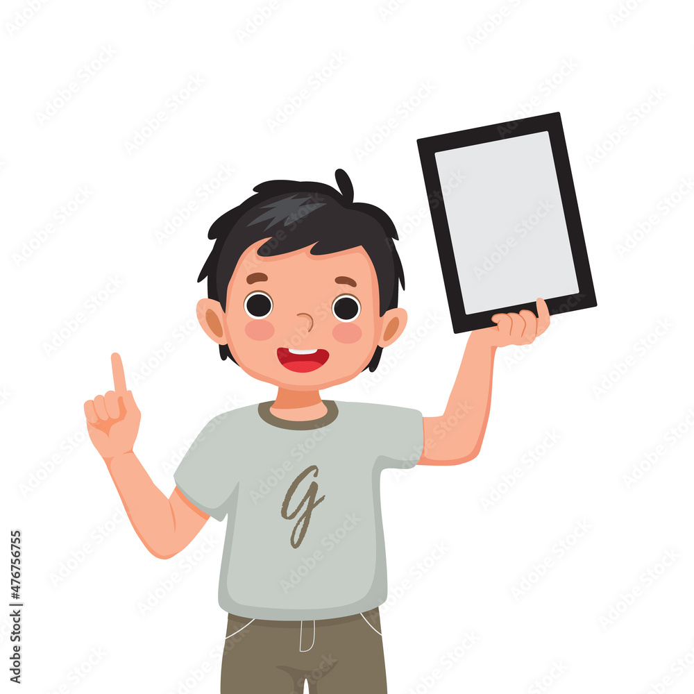 Happy little boy holding up digital tablet with finger pointing up to empty space or copy space for texts, messages and advertising content. Kids and electronic gadget devices concept for children Happy little boy holding up digital tablet with finger pointing up to empty space or copy space for texts, messages and advertising content. Kids and electronic gadget devices concept for children