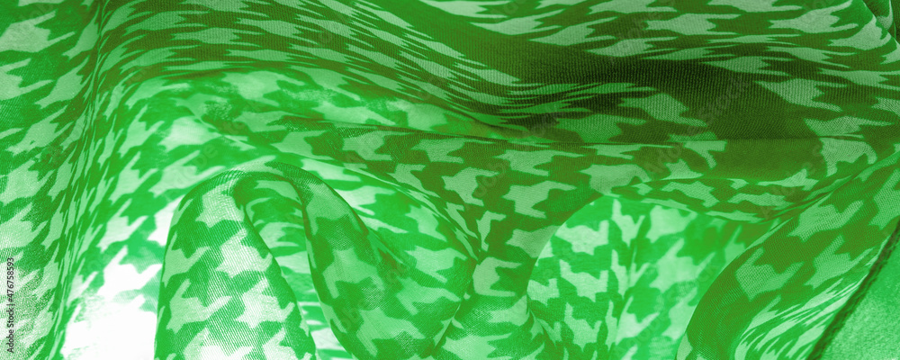 Delicate green silk chiffon in vibrant colors with geometric print. Surprisingly light, smooth, sandy to the touch fabric. One of the most elite types