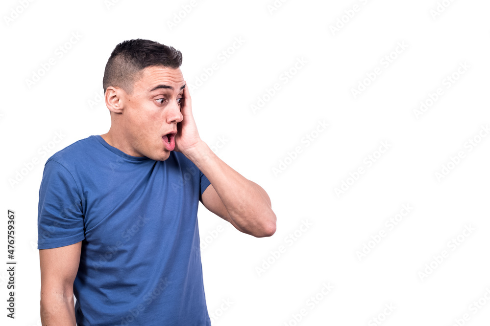 Man with his hand on his cheek with puzzled expression Man with his hand on his cheek with puzzled expression