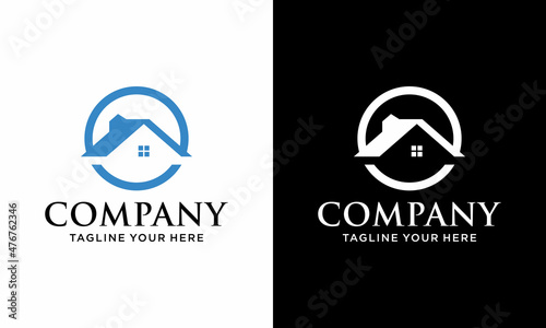 simple house or home in circle - concept vector graphic. This icon also represents real-estate, property market, residential building, etc. on a black and white background. 
