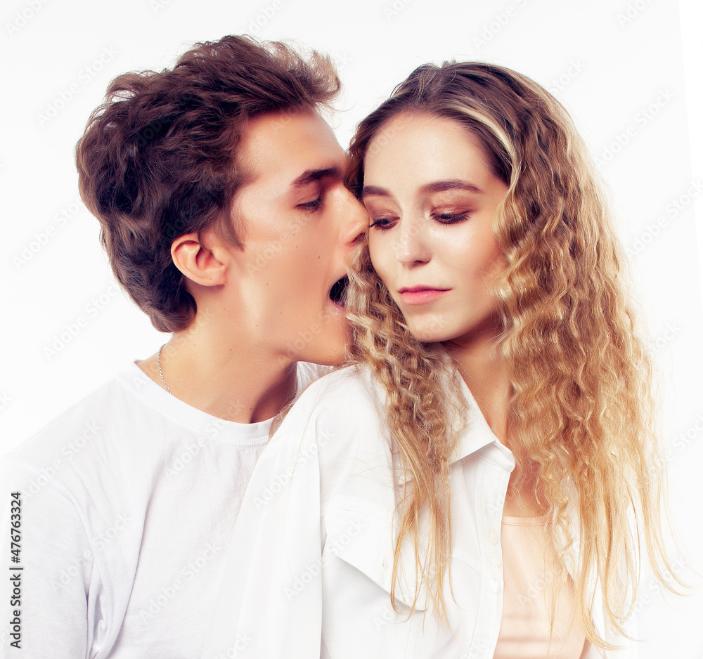 young attractive couple together having fun happy smiling isolated on white background, emotional posing, lifestyle people concept young attractive couple together having fun happy smiling isolated on white background, emotional posing, lifestyle people concept
