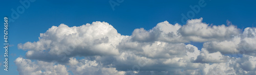 Designer Photography. Sky and clouds cumulus on a blue backgroun