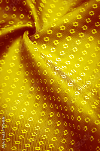 Background texture, decorative ornament, yellow gold silk fabric, with small prints, wealth, riches, richness, rich, fortune