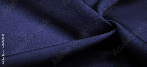 blue silk fabric, this is silk satin weaving. Differs in density, smoothness and gloss of the front side, softness, Texture, background