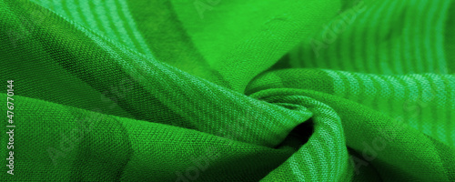 Texture. Background. Silk fabric green fresh color, of the color