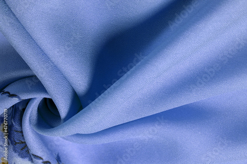 Crepe de Chin. pale blue, brown flowers. This is a group of silk, characterized by roughness, as well as slightly wrinkled. Texture, pattern