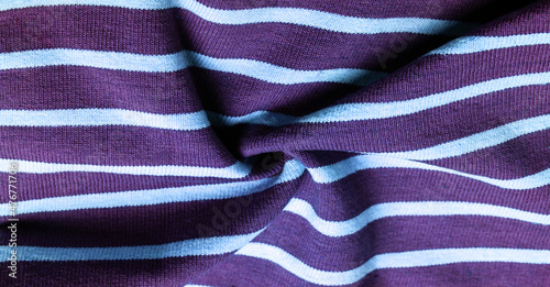 fabric from lilac and pale blue woolen stripes, woolen knitwear that is elegant and pleasant to work with. Great for your projects. Texture