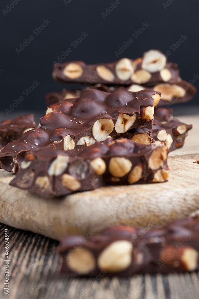 homemade chocolate with a large number of nuts homemade chocolate with a large number of nuts