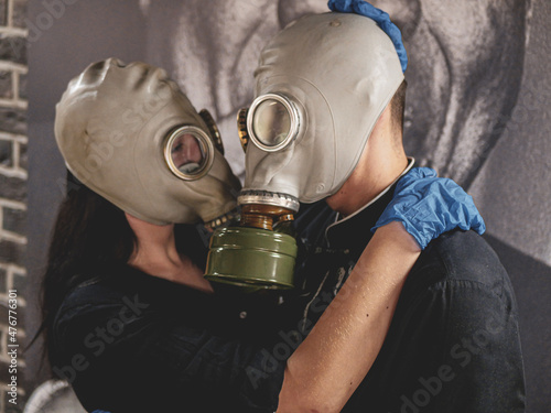 man and woman with gas mask