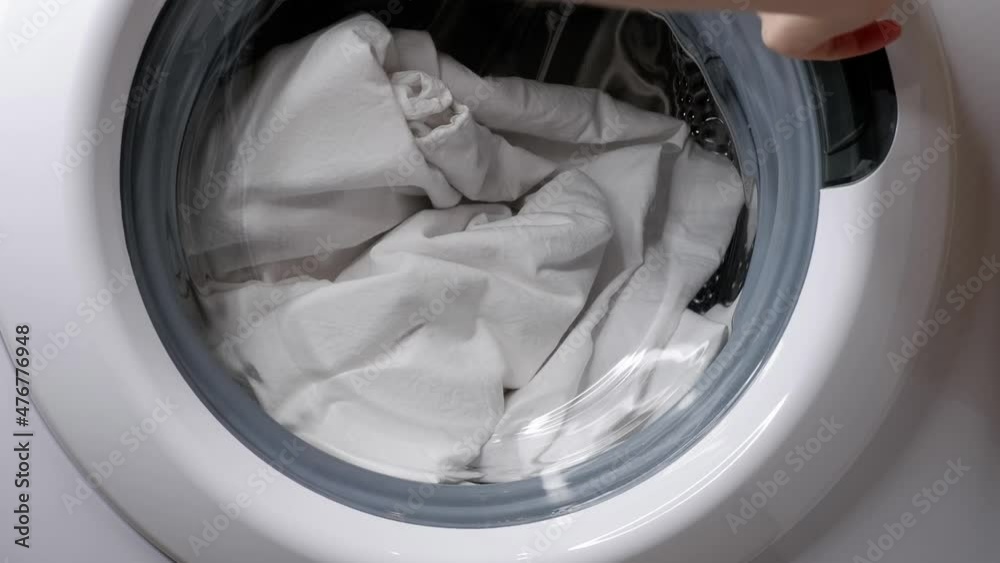 Closing the washing machine. Laundry. Closing the washing machine. Laundry.
