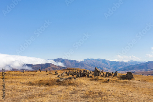 Standing stones in Zorats-Karer or Karahunj on a mountain plateau, Armenia. © Crazy nook