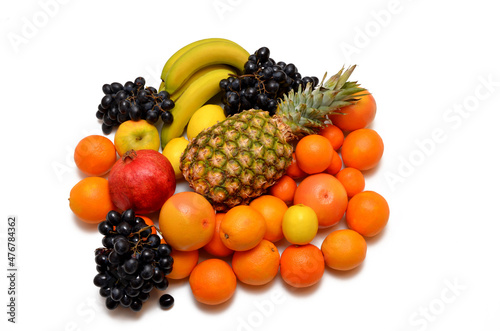 fresh assorted tropical fruits on isolated white background