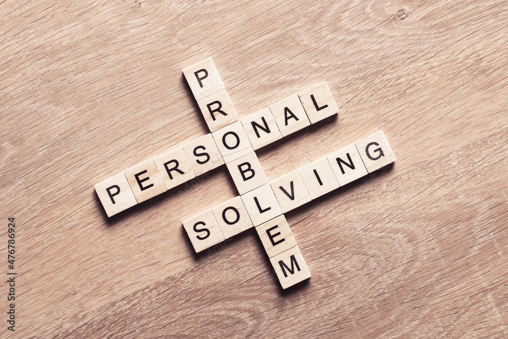 Conceptual business keywords on table with elements of game making crossword