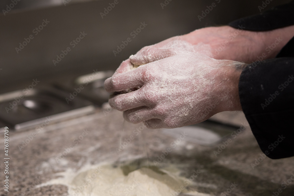 Hands in flour. Hand-made dough for homemade bread, pizza, pasta recipe