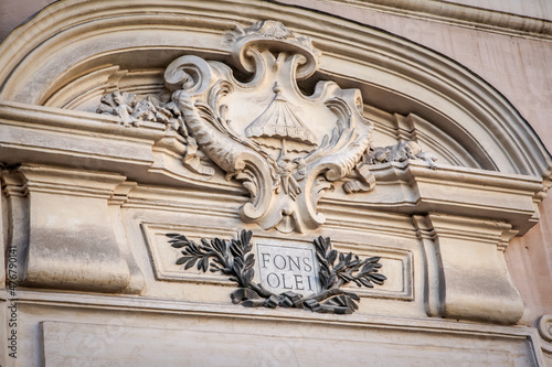 The source of the oil (Fons Olei)is an inscription in Latin on the facade of the Basilica of Santa Maria in Trastevere. Rome, Italy photo