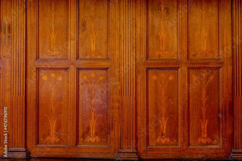 Fototapeta Naklejka Na Ścianę i Meble -  Traditional wood carving on brown wood..