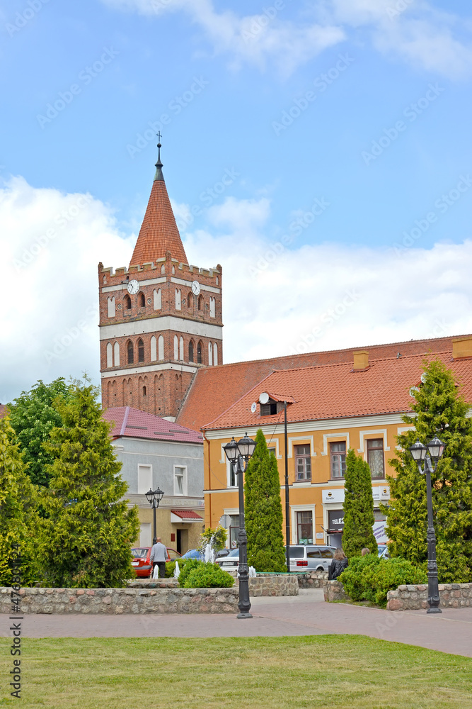 Fototapeta premium PRAVDINSK, RUSSIA - JUNE 17, 2015: A fragment of the square of the 50th anniversary of the Victory with a tower in the background. Kaliningrad region