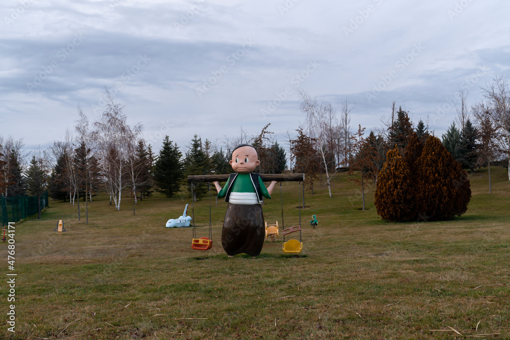 Ankara, Turkey - December 11 2021: A swing made in the name of Turkish fairy tale hero Keloglan. Ankara, Turkey - December 11 2021: A swing made in the name of Turkish fairy tale hero Keloglan.