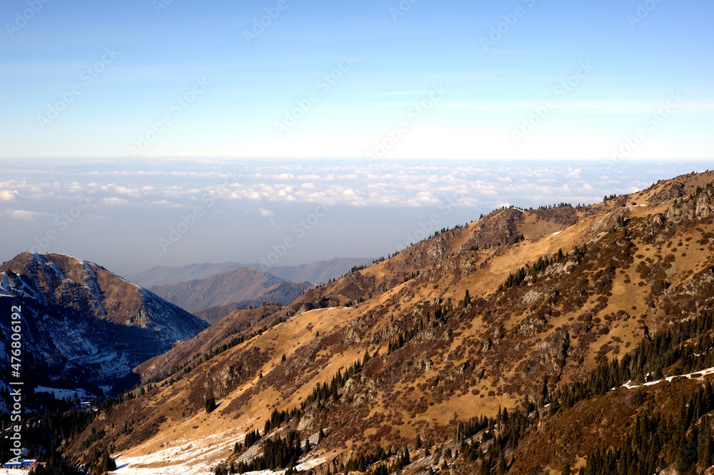 Majestic mountain peaks covered with snow (altitude: over 3200 meters). Ile Alatau, also spelt as Trans-Ili Alatau, etc., is a part of the Northern Tian Shan mountain system in Kazakhstan
