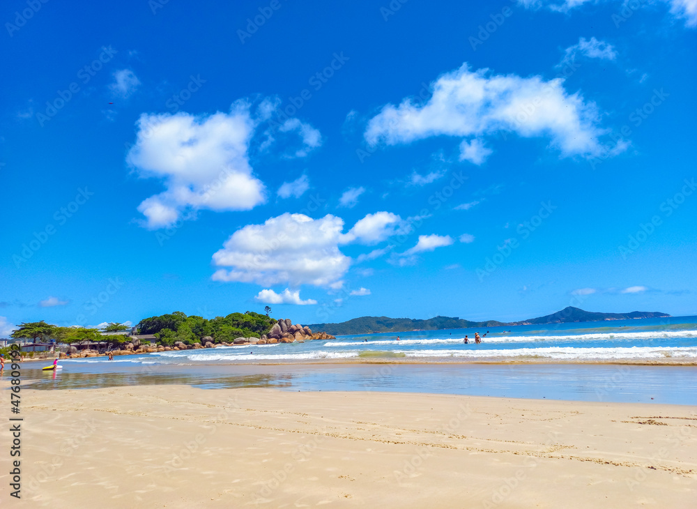 beach with sky tropical beach of Conceição, Bombinhas, state of Santa Catarina, Brazil