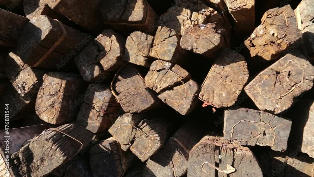Stack of old railroad ties - pile of wooden sleepers, used and discarded. Stack of old railroad ties - pile of wooden sleepers, used and discarded.