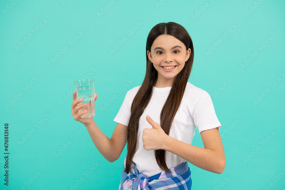 happy teen girl drink water keep daily water balance in body show thumb up, daily water. happy teen girl drink water keep daily water balance in body show thumb up, daily water.