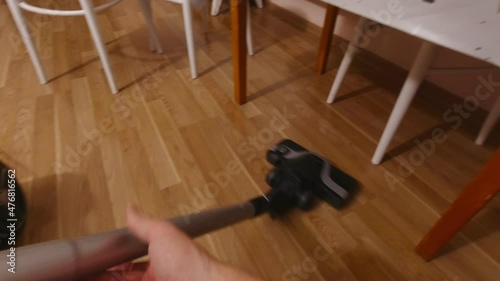Vacuuming under the table man point of view