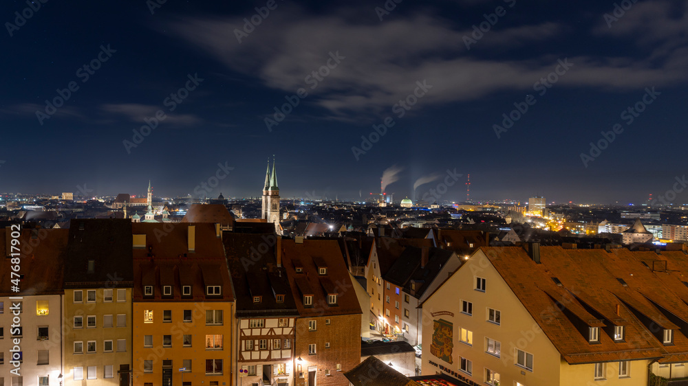 Illuminated city skyline in German city Nuremberg