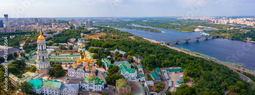 Magical aerial view of the Kiev Pechersk Lavra near the Motherland Monument. UNESCO world heritage in Kyiv, Ukraine. Kiev Monastery of the Caves. © Aerial Film Studio