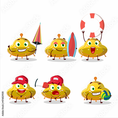 Happy Face UFO yellow gummy candy cartoon character playing on a beach