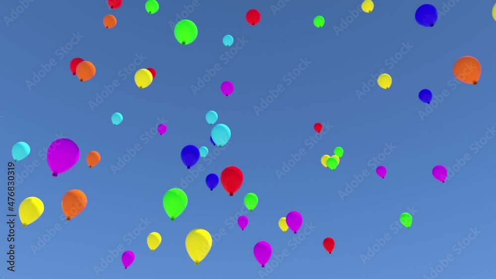 Bright rainbow balloons fly into the depths of the blue sky. Bright rainbow balloons fly into the depths of the blue sky.