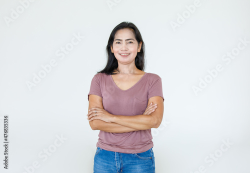 Portrait Asian beautiful woman wearing casual shirt standing crossed arms smiling look at the camera on white background, blank copy space with isolated