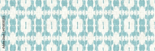 Aegean teal geometric border strip linen texture background. Summer coastal living style home decor fabric effect. Sea green wash grunge edge material. Decorative textile geo seamless pattern banner.