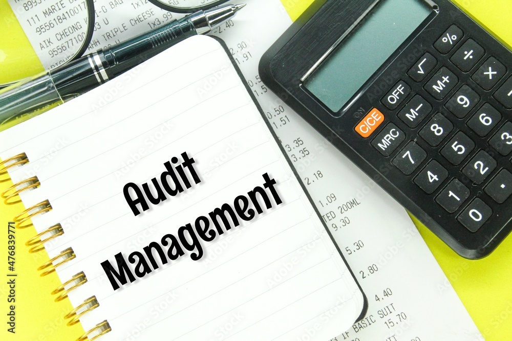 calculators, receipts, pens and notebooks with the word audit management calculators, receipts, pens and notebooks with the word audit management