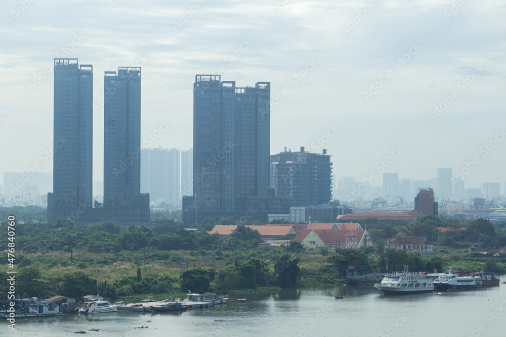 Obraz premium One of view of Ho Chi Minh city, urban with many office building, state bank, luxury hotel by Saigon river