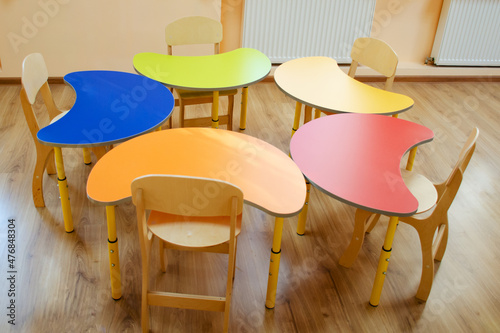 Colored children's tables preschoolers. Fashionable interior for children