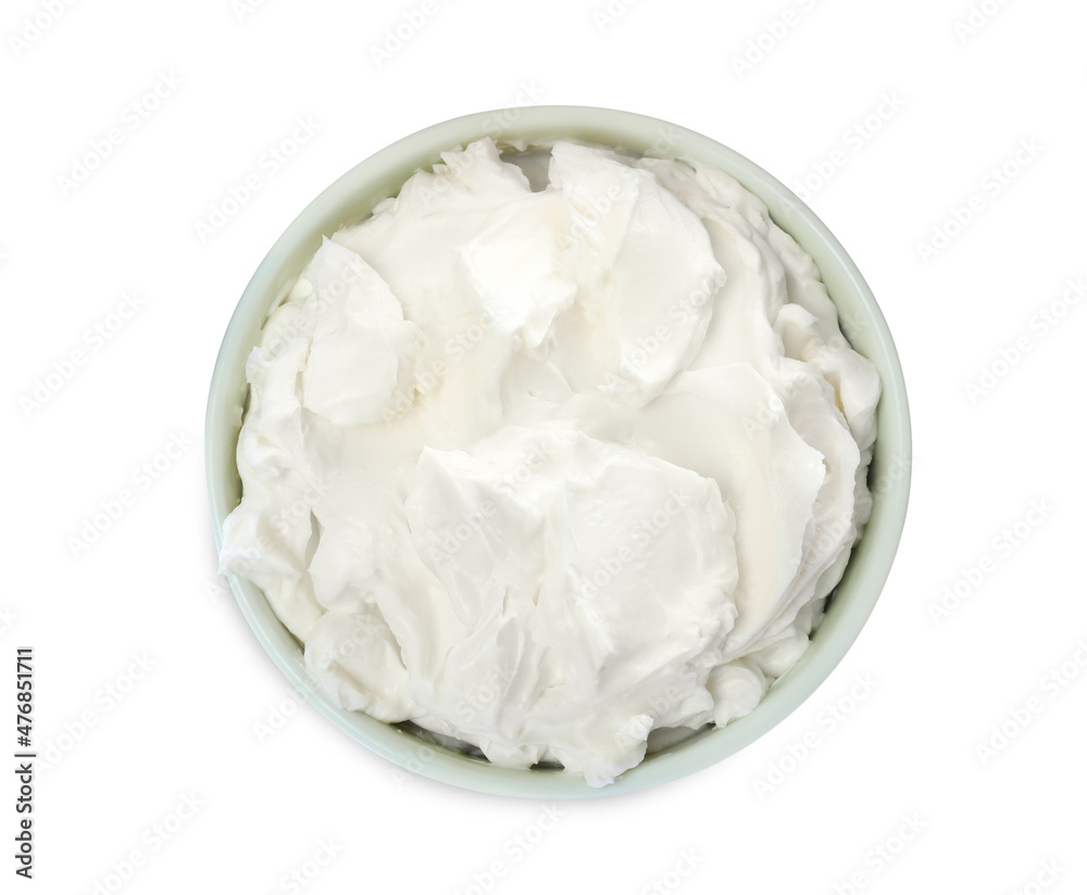 Bowl of tasty cream cheese isolated on white, top view