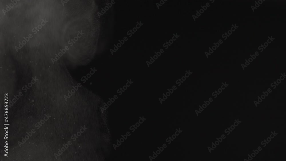 Steam rising over black background Steam rising over black background