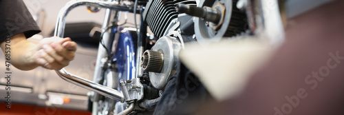 Fotografering Repair and maintenance of motorcycle engines in car workshop closeup