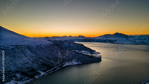 Norwegian Fjord with snowy mountains and a "Sunset" during Polar Night - Drone Perspective Landscape Photography